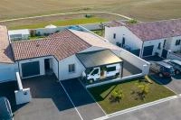 Carport photovoltaïque adossé Alusun